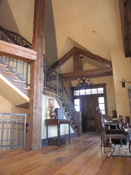 Hand-Hewn Timbers / These hand-hewn timbers were stained by the contractor before installation